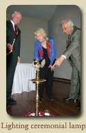 Rafi Ahmed, Dean Lawley and Claudia Adkison at a lamp lighting ceremony in New Delhi, India.