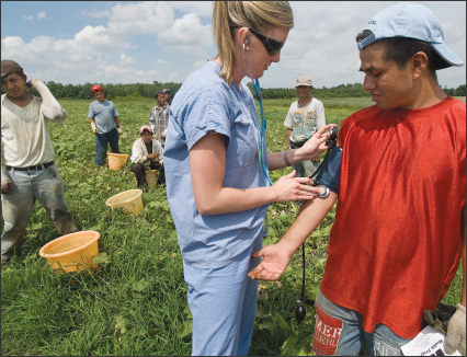 Emory nursing students offer check-ups to migrant workers.