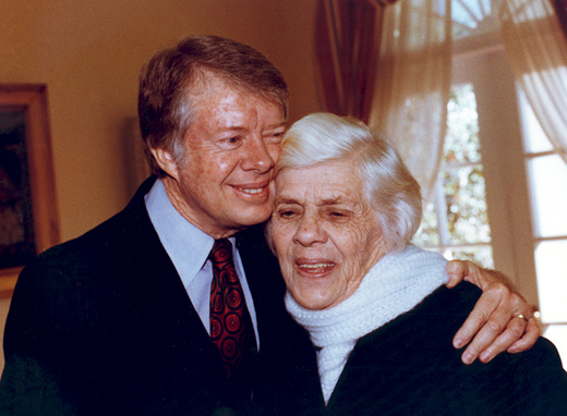 In this White House photo, President Jimmy Carter hugs Miss Lillian, mother, nurse and Peace Corps volunteer.