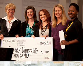 Dean Linda McCauley accepts the 2011 Senior Class Gift from officers Keely Passman (second from left), Kim Freeman, Kara Short, and Lynei Woodard. Their class gift supports nursing scholarships.
