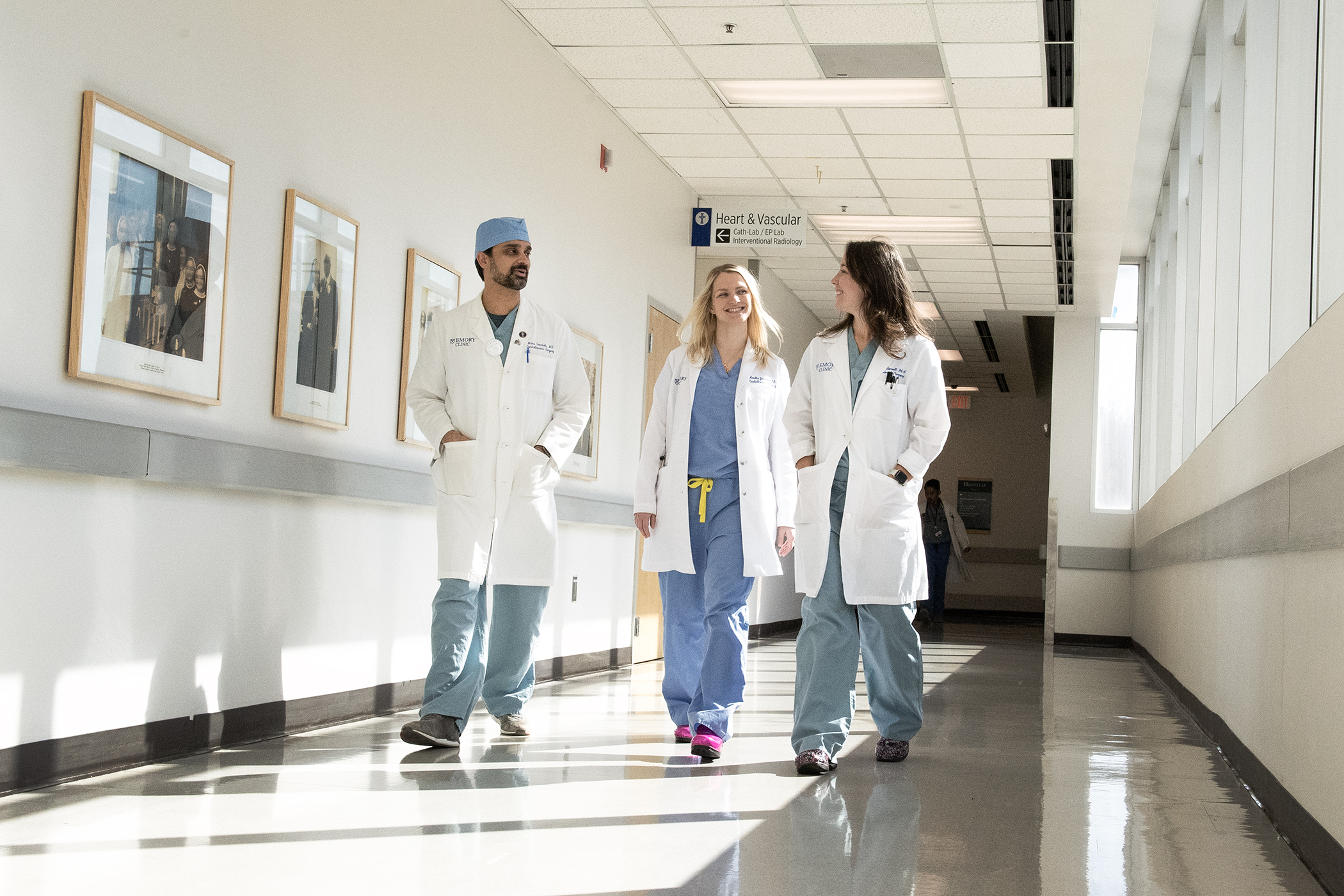 doctors walking down a hospital hallway